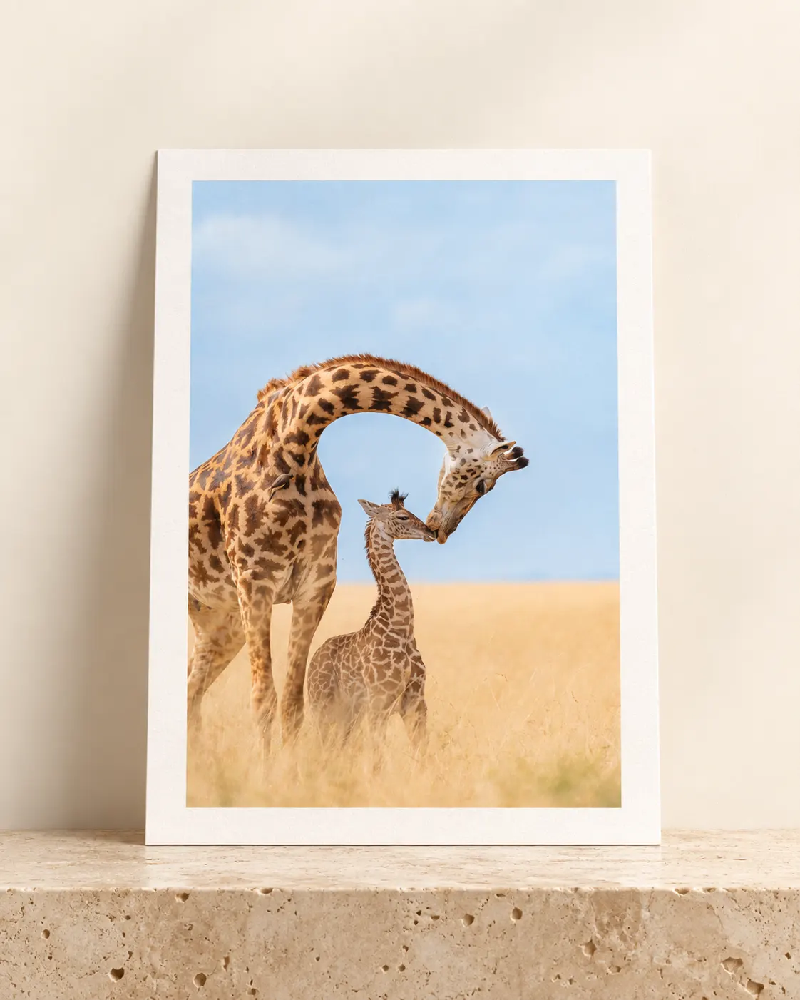 Mother's Love print standing on a travertine plinth